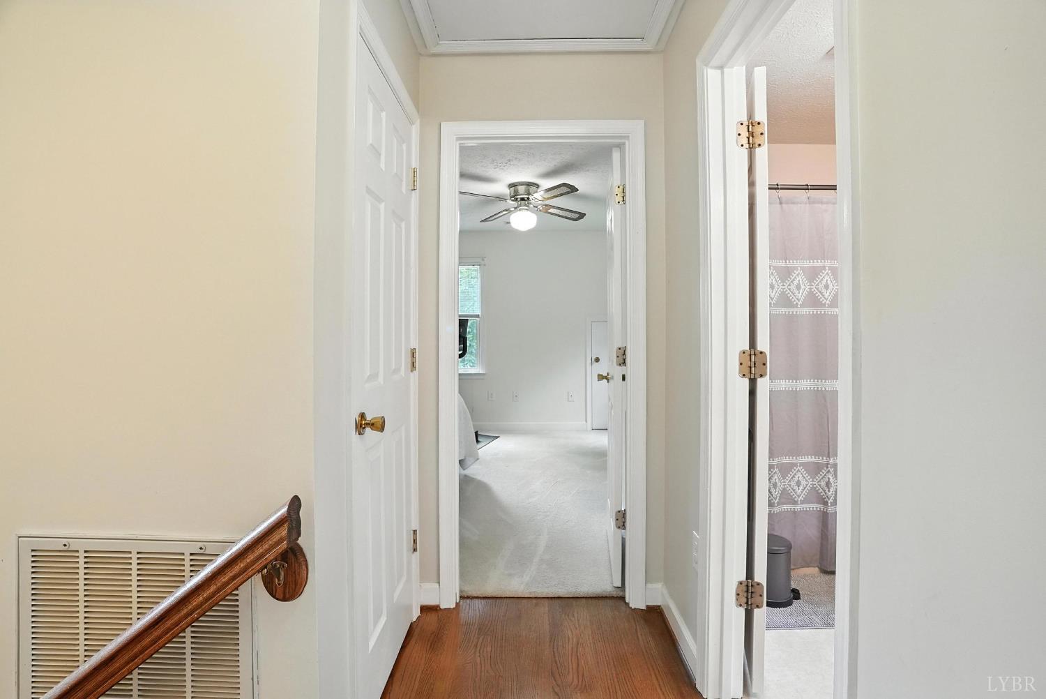 69 Gough Road Rustburg, VA 24588 - Photo 35 of 61 a view of a hallway with wooden floor and staircase