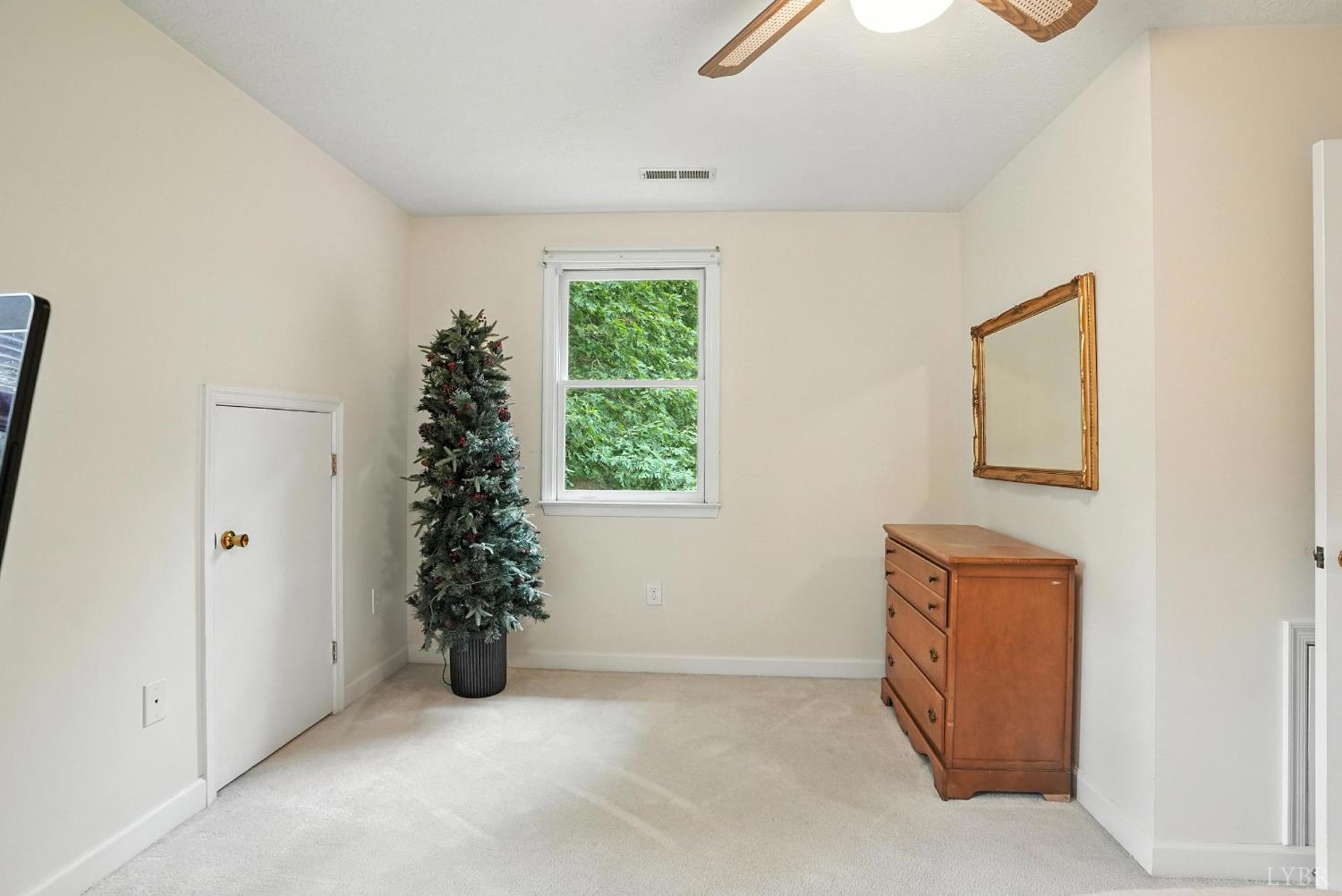 69 Gough Road Rustburg, VA 24588 - Photo 39 of 61 an empty room with a window and a garage