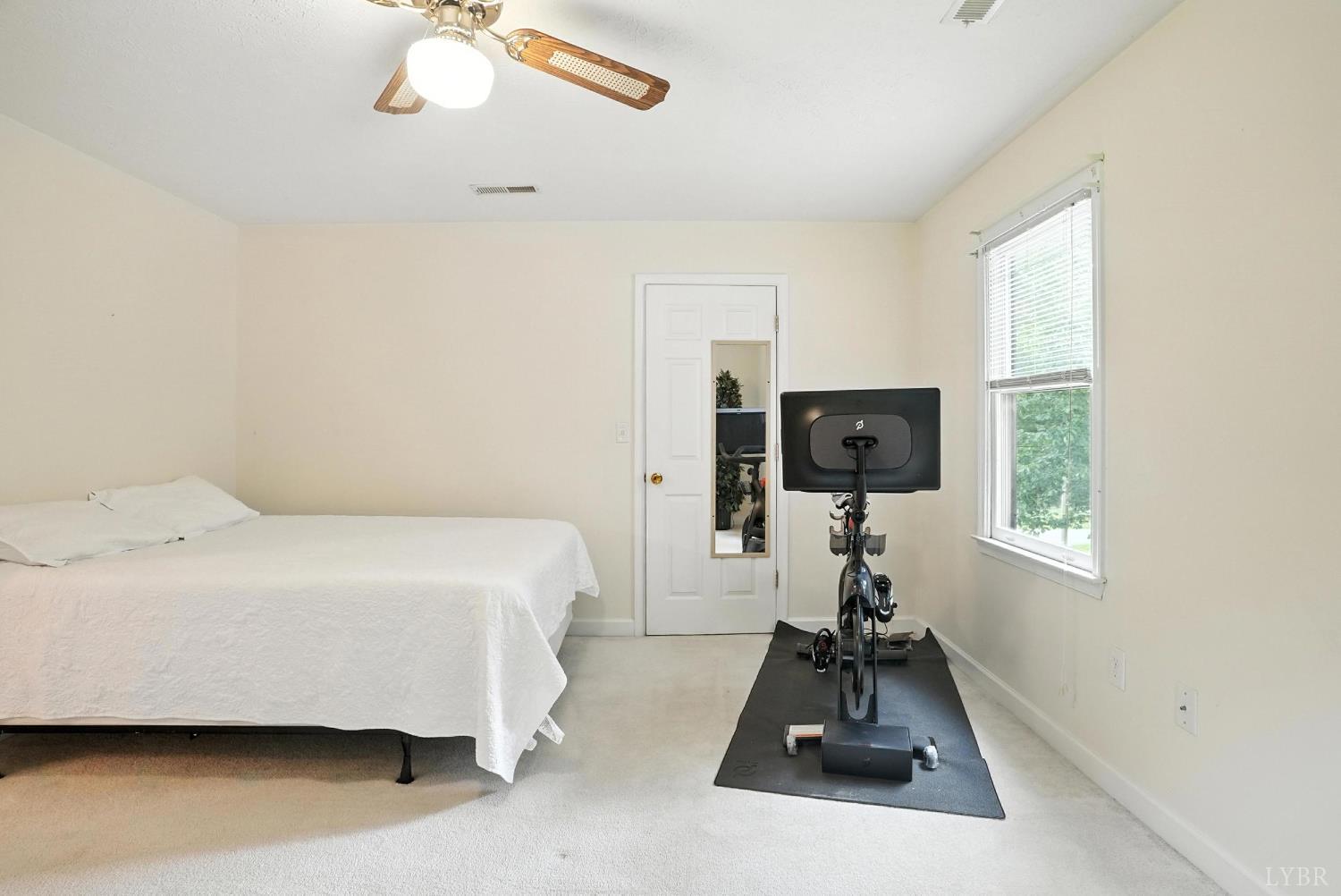 69 Gough Road Rustburg, VA 24588 - Photo 40 of 61 a bedroom with a bed and a window