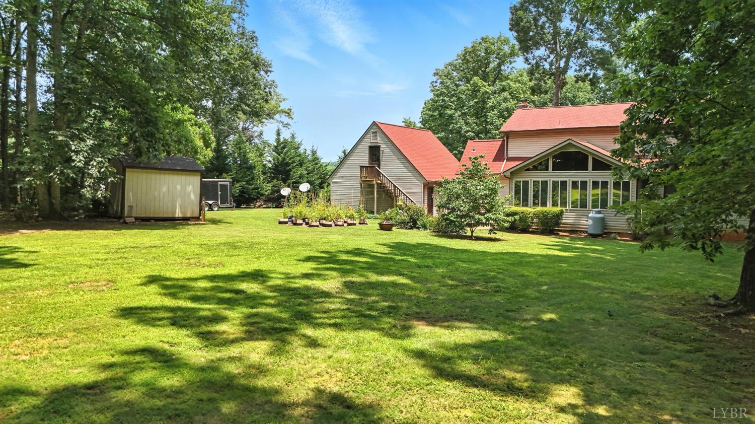 69 Gough Road Rustburg, VA 24588 - Photo 49 of 61 a front view of house with yard and green space