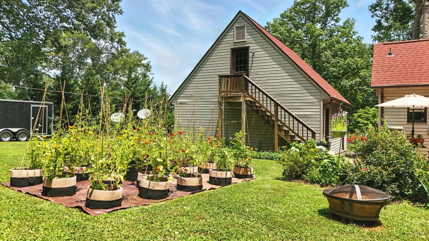 69 Gough Road Rustburg, VA 24588 - Photo 50 of 61 a view of a backyard with sitting area