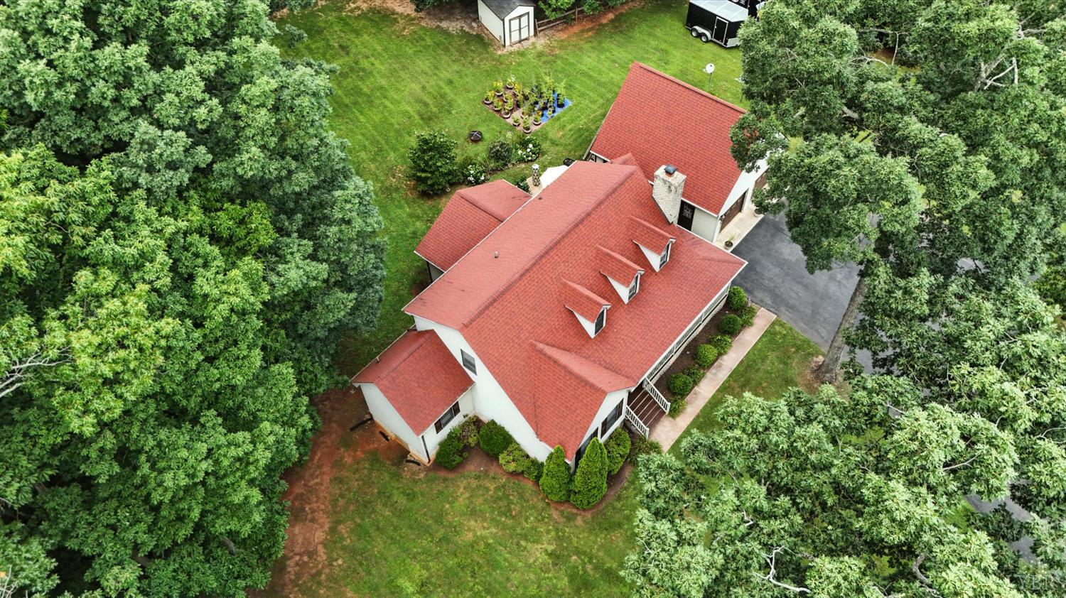 69 Gough Road Rustburg, VA 24588 - Photo 55 of 61 an aerial view of a house with yard swimming pool and outdoor seating