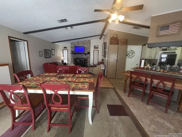 a view of a dining room with furniture