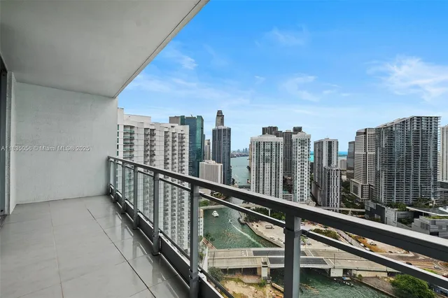 a view of city with tall buildings