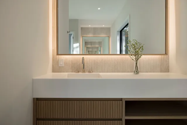 a bathroom with a bathtub and a sink