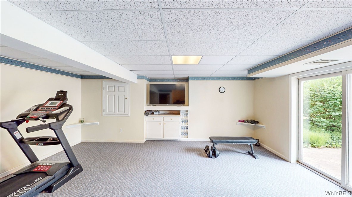 7155 Combs Drive Eden, NY 14075 - Photo 24 of 36 Partially finished "living area" w/ shelving in ba
