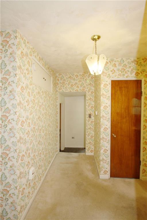 366 Moon Clinton Road Coraopolis, PA 15108 - Photo 7 of 21 an empty room with a fireplace