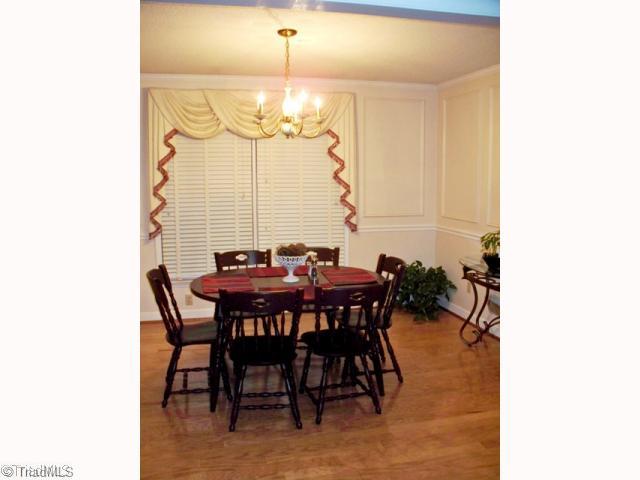 212 Cardwell Road Mayodan, NC 27027 - Photo 4 of 16 Other. Large dining room with hardwood floors, beautiful picture frame molding, chair rail molding, and crown molding.