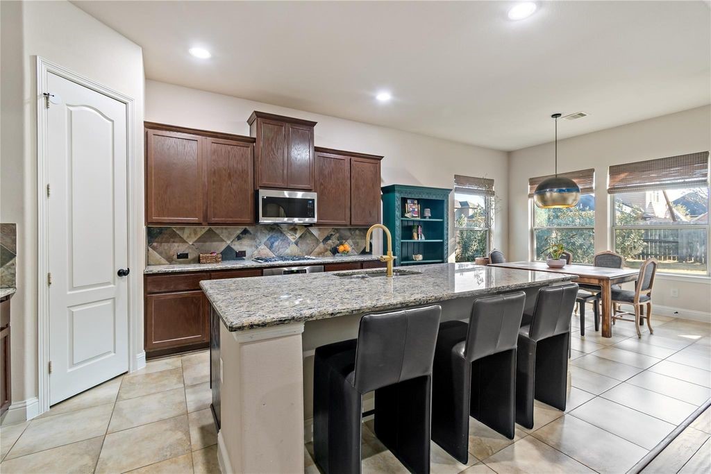 8126 Spreadwing Street Conroe, TX 77385 - Photo 7 of 27 Kitchen