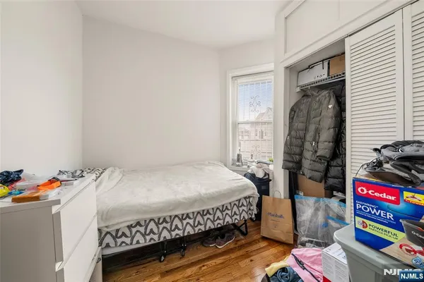 a kitchen with stainless steel appliances granite countertop a refrigerator a stove and a sink