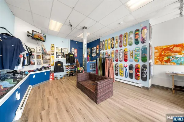 a workspace with furniture and wooden floor