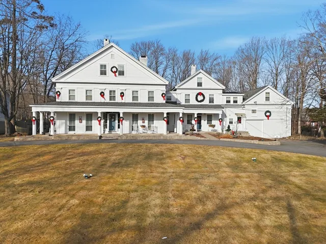 a front view of a house with a ocean view