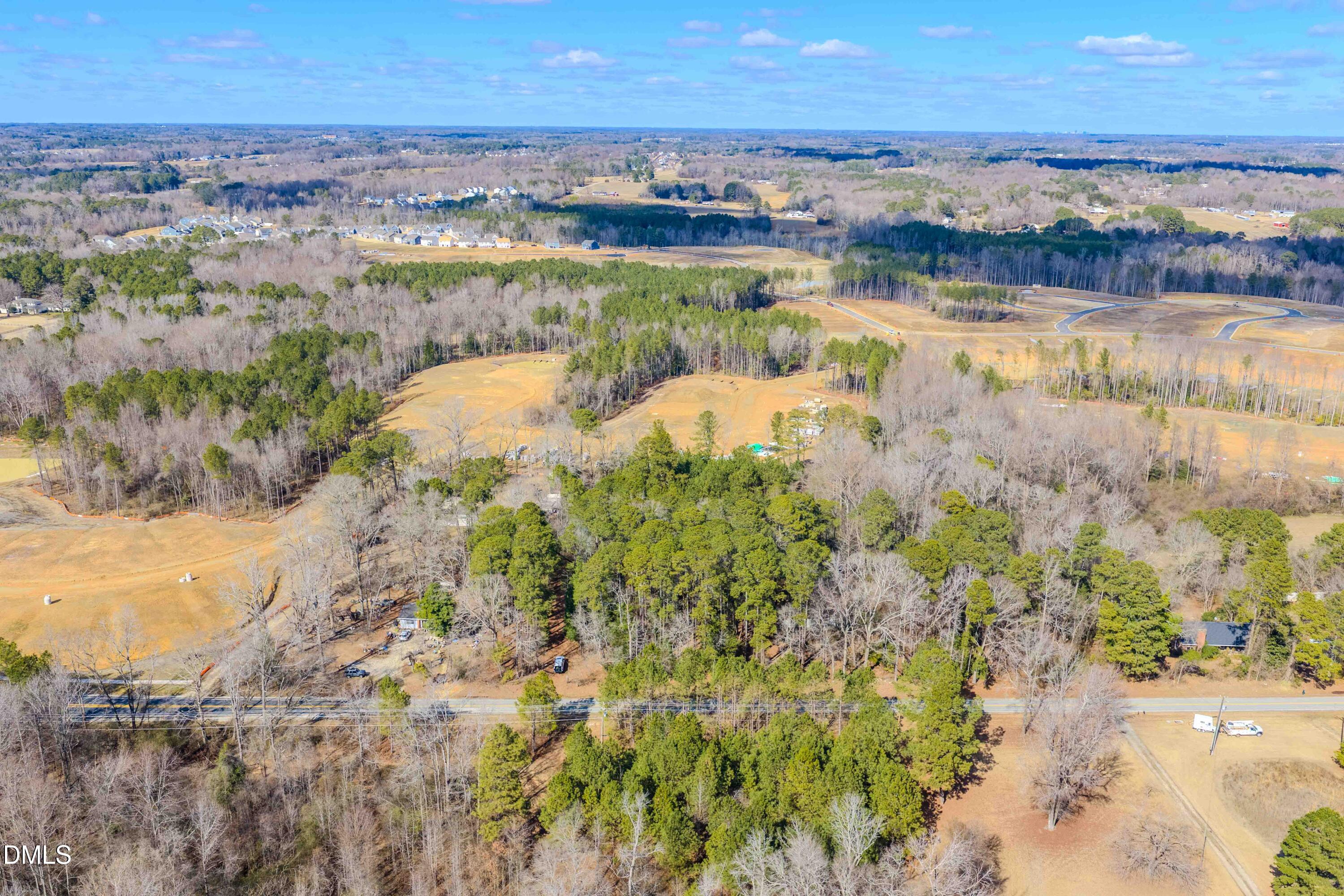 a view of a lake with a city