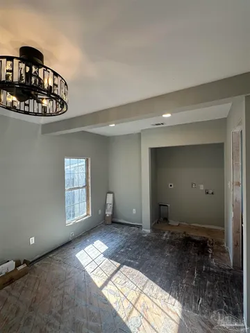 a view of an empty room and window