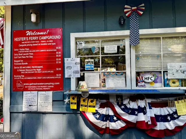 an outdoor space with lots of play tables and chairs