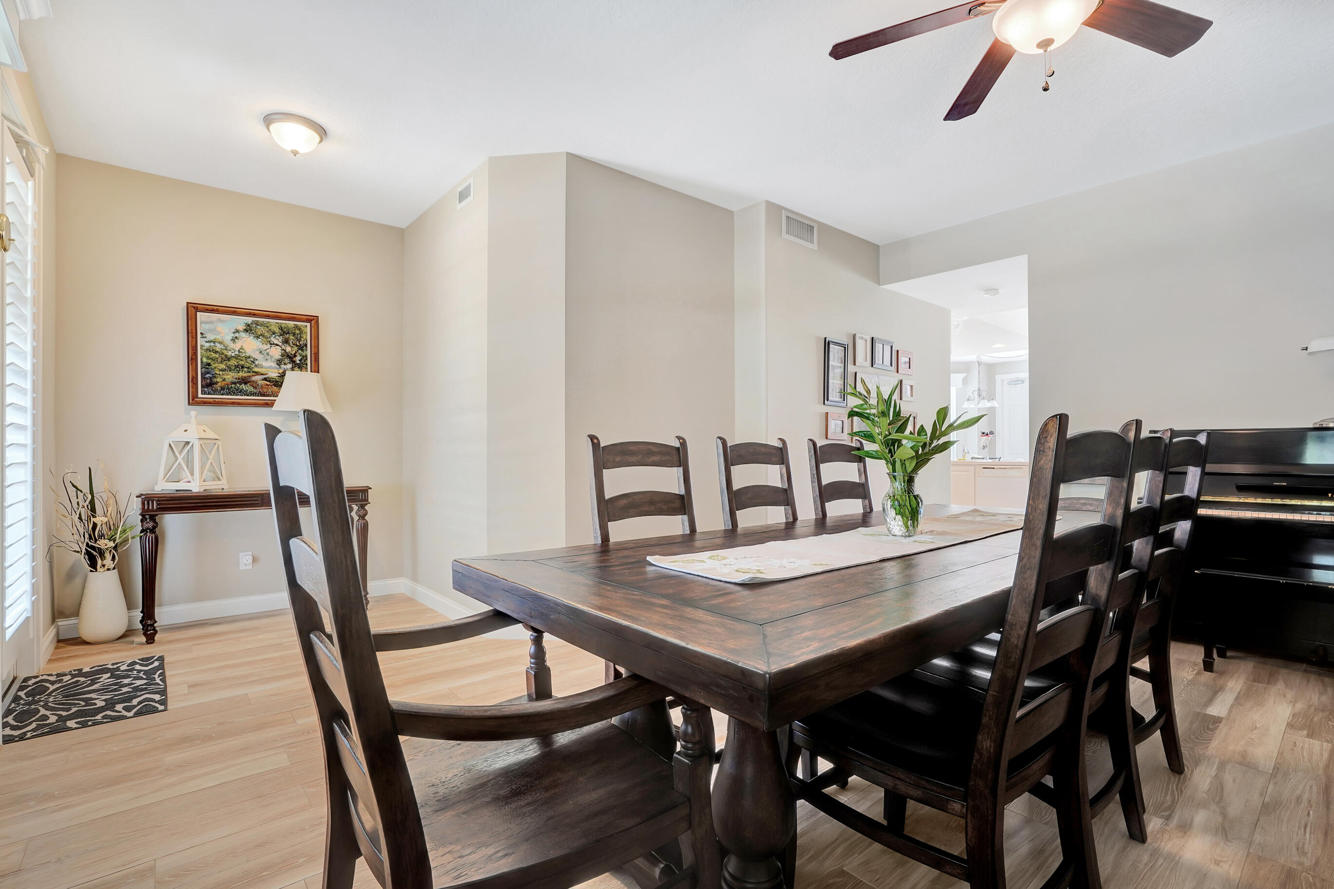 1687 Frederick Small Road Jupiter, FL 33458 - Photo 11 of 27 a view of a dining room with furniture