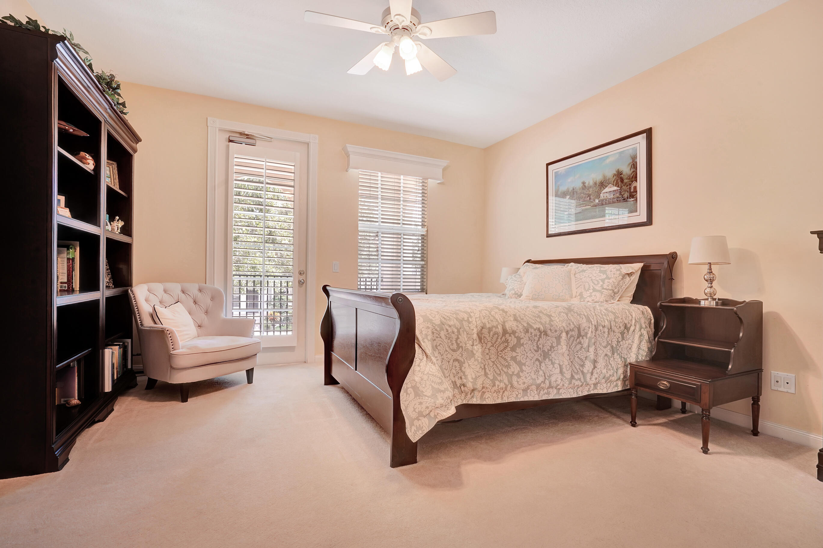 1687 Frederick Small Road Jupiter, FL 33458 - Photo 13 of 27 a bedroom with a bed furniture and a window