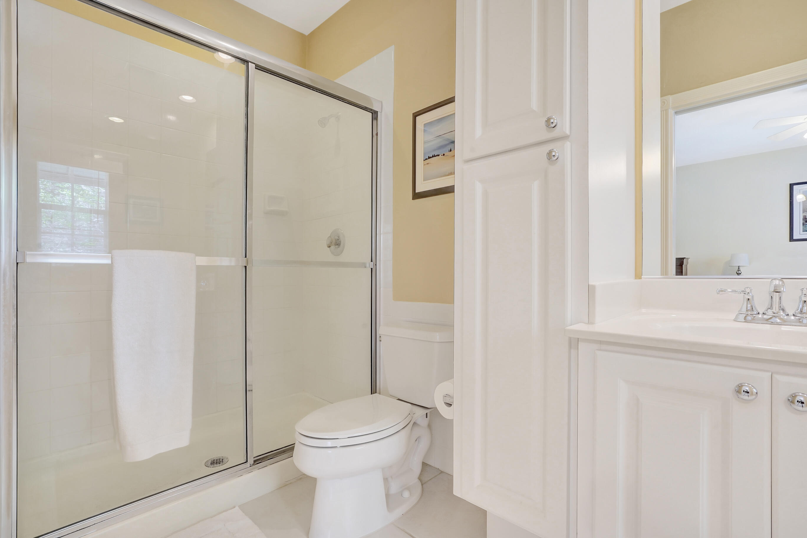 1687 Frederick Small Road Jupiter, FL 33458 - Photo 15 of 27 a bathroom with a shower a toilet and a sink