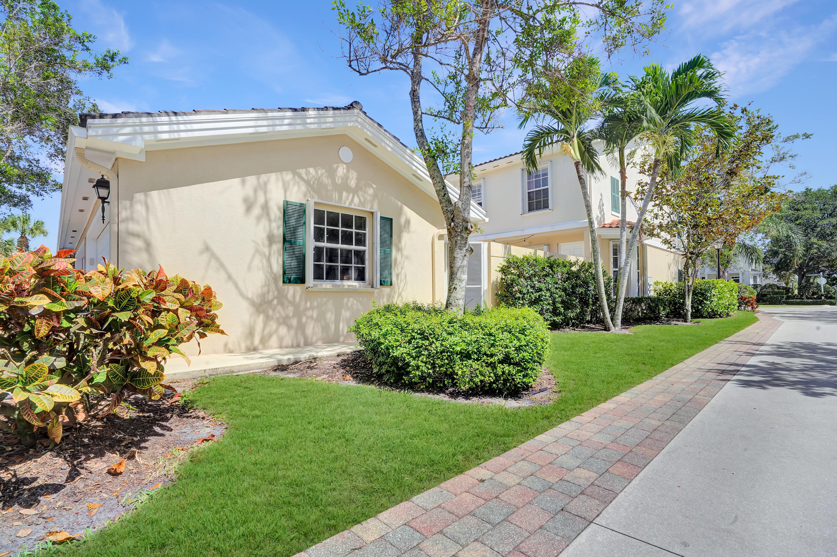 1687 Frederick Small Road Jupiter, FL 33458 - Photo 25 of 27 a view of a house with a yard