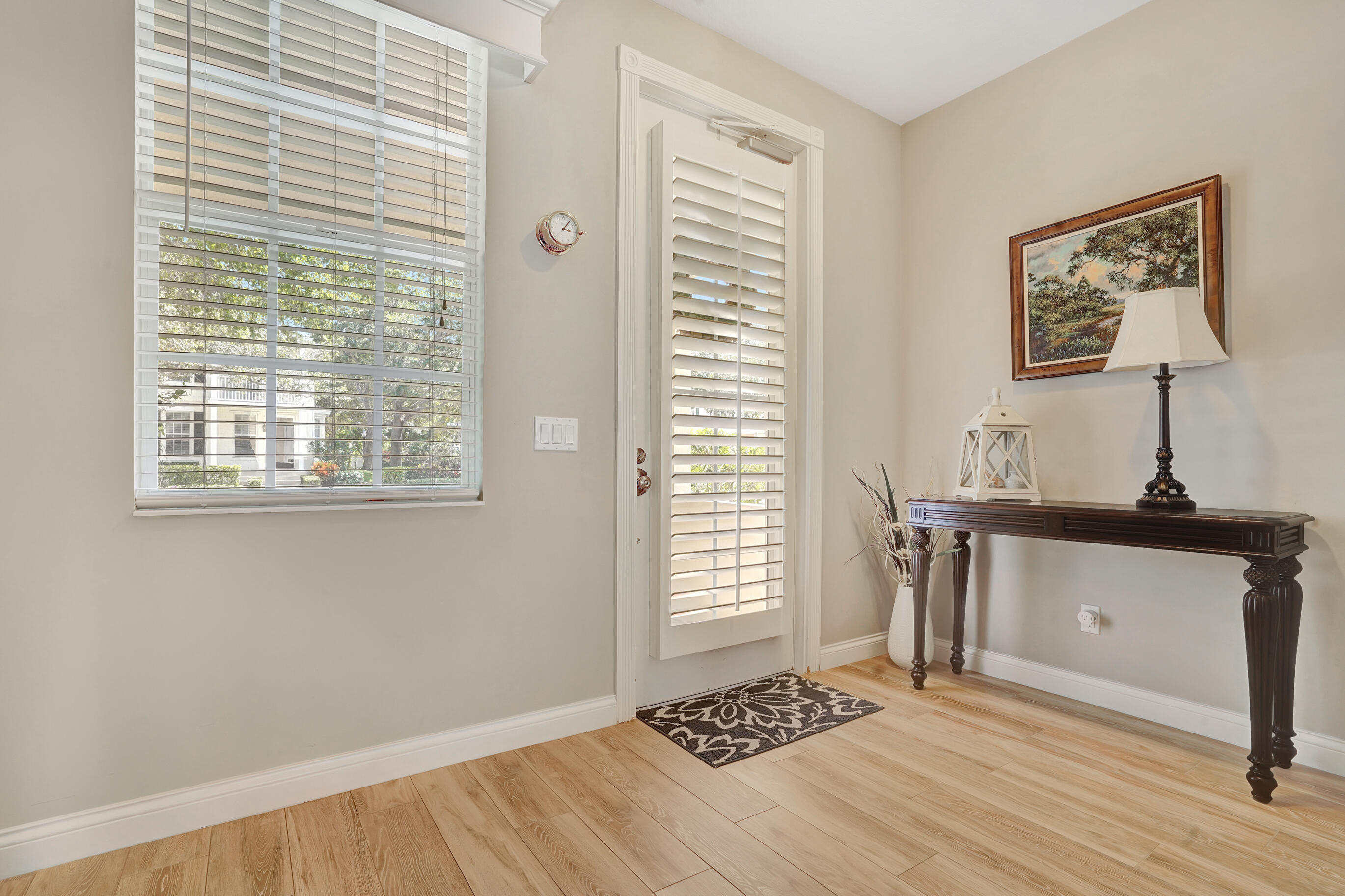 1687 Frederick Small Road Jupiter, FL 33458 - Photo 8 of 27 a view of a room with a window and a bathroom