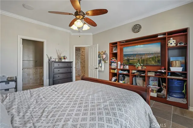 a view of a hallway with wooden floor and windows
