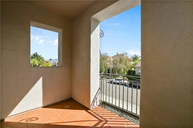 a bed room with a bed and a flat screen tv