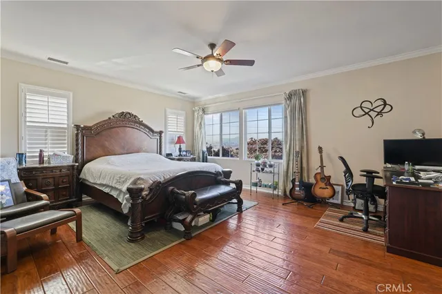 a spacious bathroom with a tub a double vanity sink and a mirror