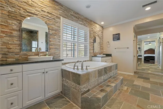 a bedroom with a bed and furniture