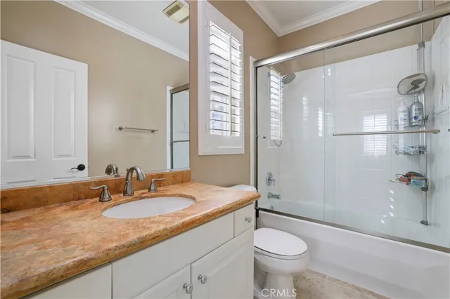 a swimming pool with outdoor seating yard and barbeque oven