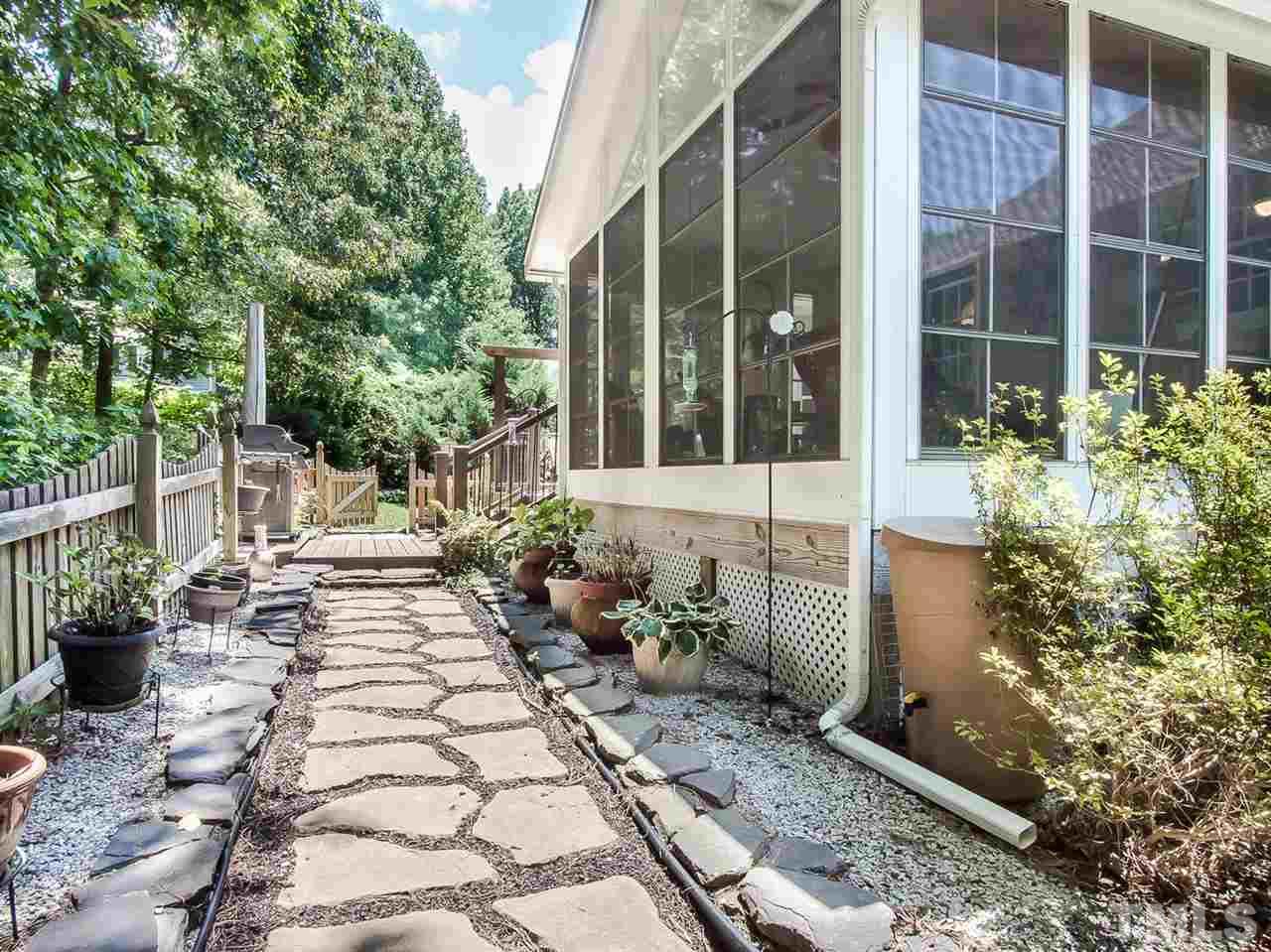 3400 Ribcowski Court Raleigh, NC 27616 - Photo 24 of 25 a view of a backyard with sitting area