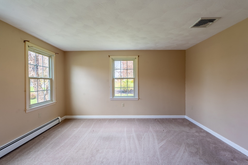 15 Mansfield Road Middleton, MA 01949 - Photo 12 of 42 an empty room with a window