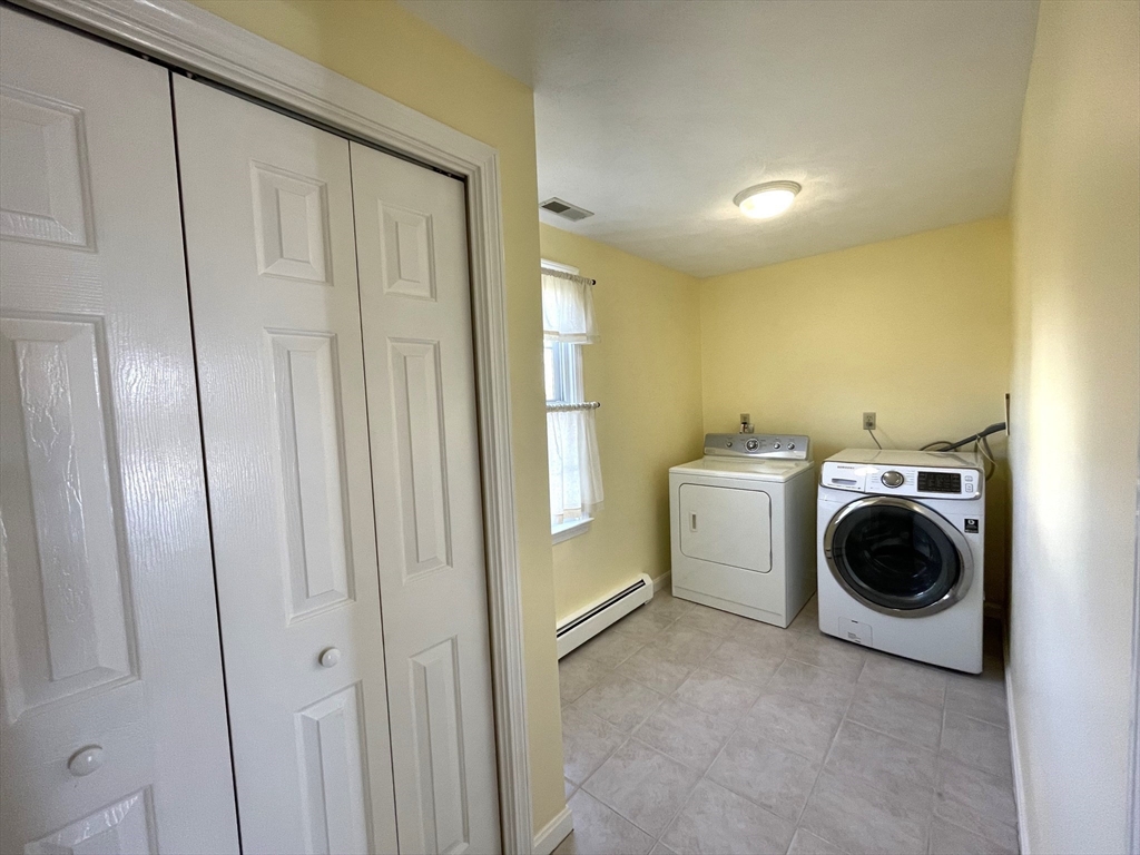 15 Mansfield Road Middleton, MA 01949 - Photo 14 of 42 a utility room with dryer and washer