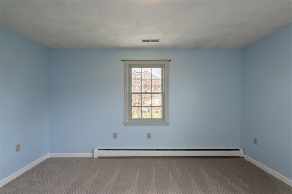 15 Mansfield Road Middleton, MA 01949 - Photo 22 of 42 an empty room with a window