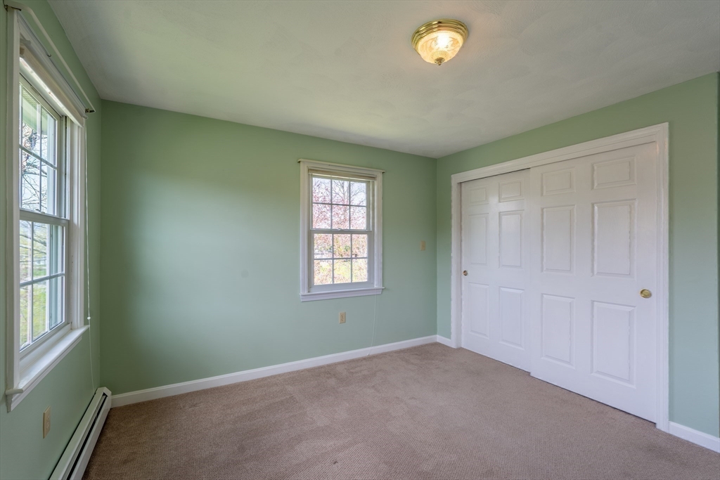 15 Mansfield Road Middleton, MA 01949 - Photo 25 of 42 an empty room with windows and closet