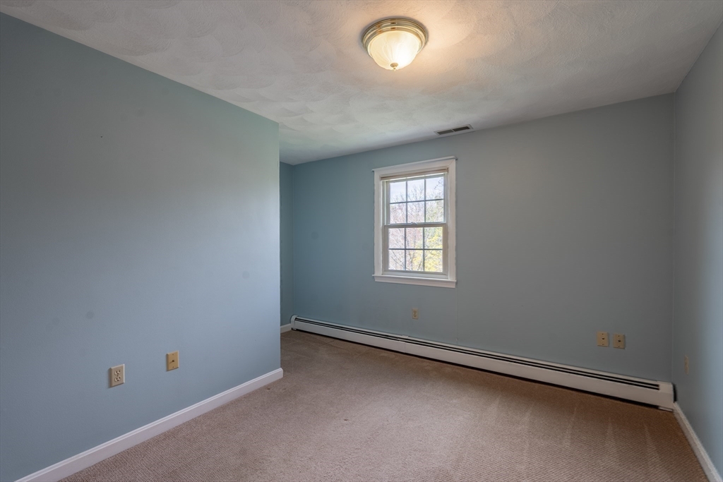 15 Mansfield Road Middleton, MA 01949 - Photo 27 of 42 an empty room with a window