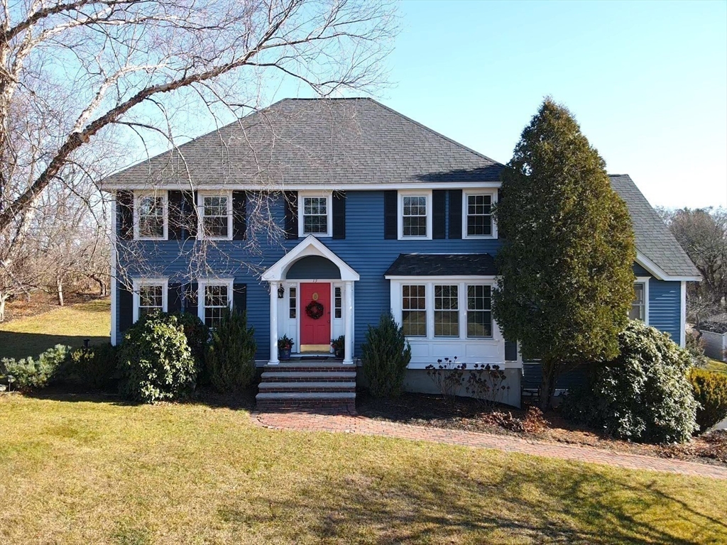 15 Mansfield Road Middleton, MA 01949 - Photo 3 of 42 a front view of a house with a yard
