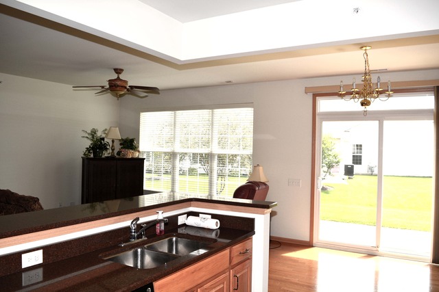 13631 Hemlock Road Huntley, IL 60142 - Photo 7 of 12 a kitchen with a sink appliances and a window