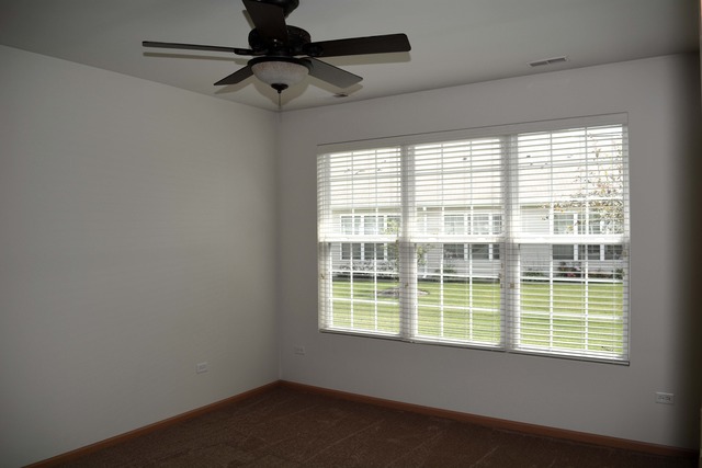 13631 Hemlock Road Huntley, IL 60142 - Photo 8 of 12 a view of an empty room with a window