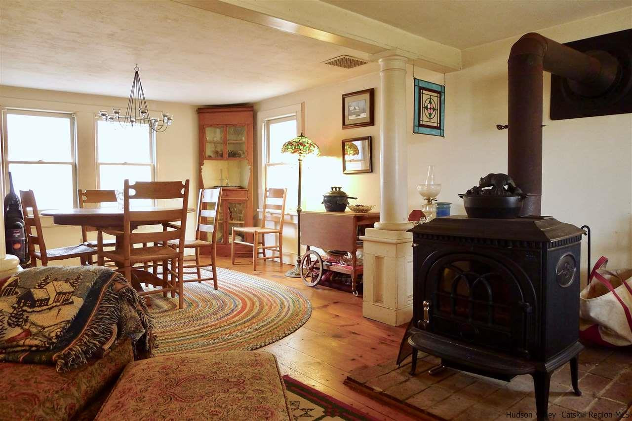45 Upper Whitfield Road Accord, NY 12404 - Photo 5 of 18 a living room with furniture and a fireplace