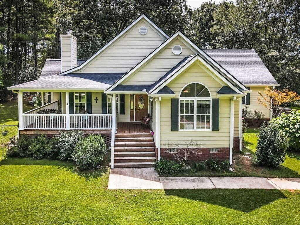 398 Hickory Grove Church Road Monroe, GA 30656 - Photo 1 of 1 a front view of a house with a yard