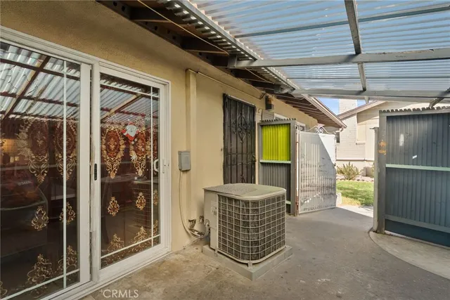 a view of an empty room with a balcony