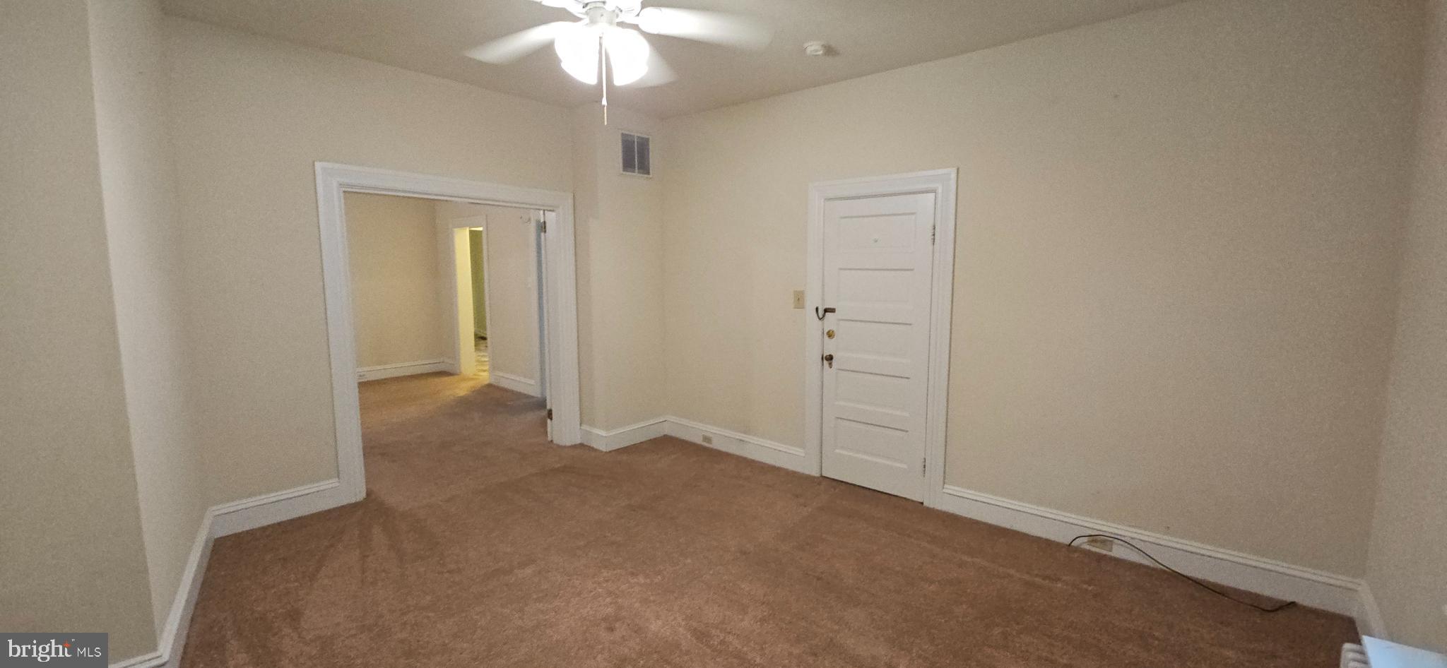 434 Fairmont Avenue, Unit 1 Winchester, VA 22601 - Photo 13 of 15 an empty room with a bathroom