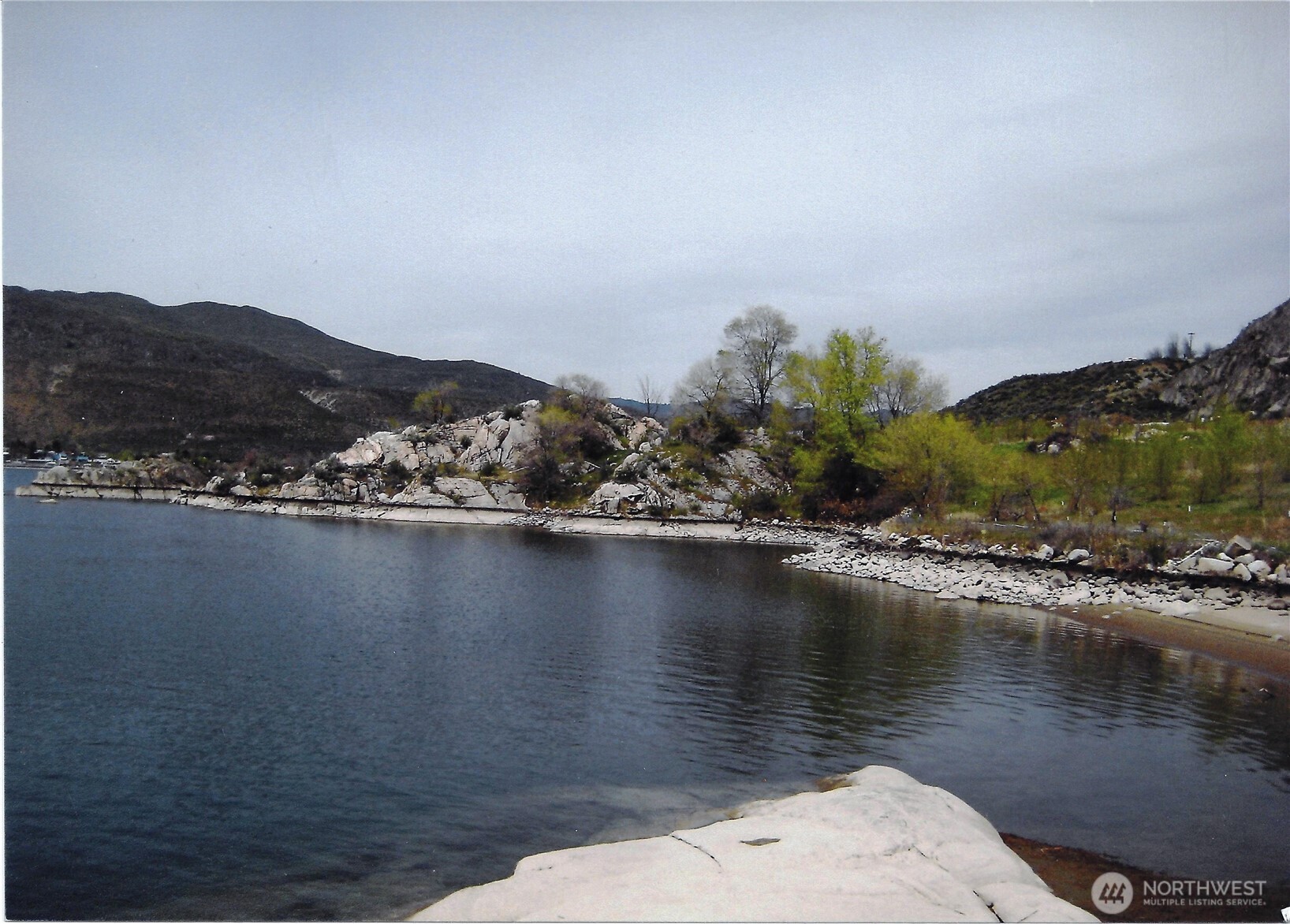 0 Bailey Way Brewster, WA 98812 - Photo 5 of 17 a view of a lake with a mountain
