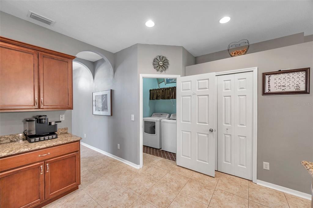 4506 Mapletree Loop Wesley Chapel, FL 33544 - Photo 43 of 60 Laundry off kitchen thru entry off garage