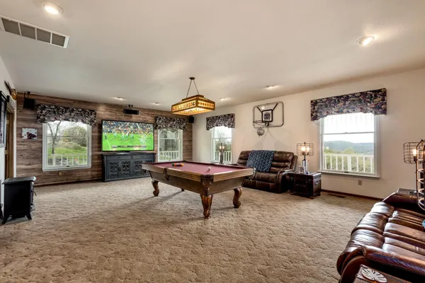 a living room with furniture and a window
