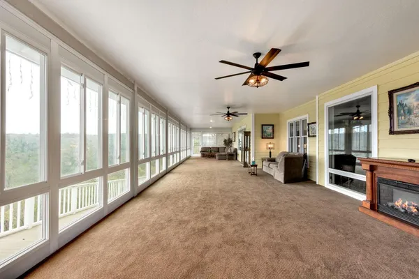 a living room with furniture and a table