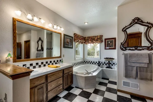 a view of a room with workspace and a window