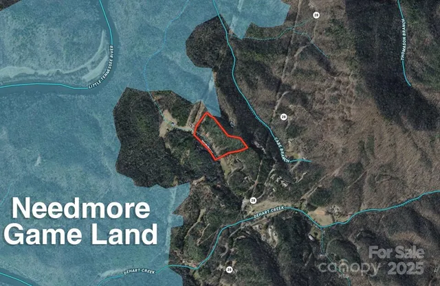 a bathroom with a white wall