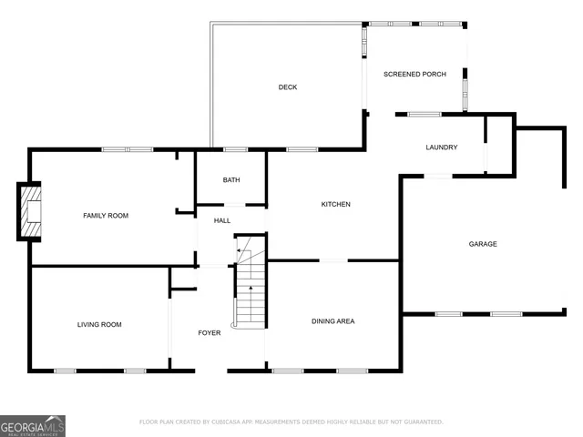 a picture of a room with a white wall and white refrigerator