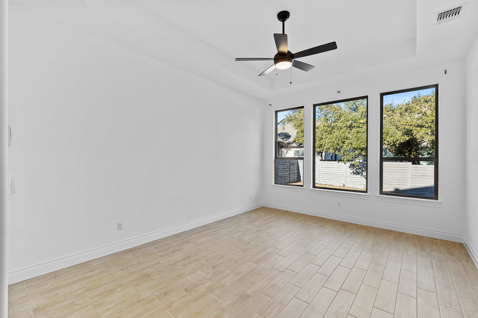 109 Strawberry Lane Georgetown, TX 78628 - Photo 16 of 40 a view of room with ceiling fan and window